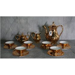 15 piece gold plated German porcelain teaset. Pot