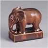 Image 1 : Rare ROOKWOOD elephant paperweight, 1936, covered in a fine Tiger Eye glaze. Several small chips to