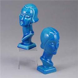 Pair of AMERICAN ART AND CLAY COMPANY female busts, both covered in a bright blue glossy glaze. Stam