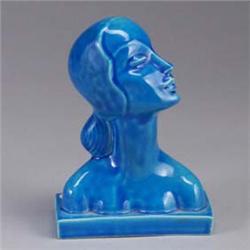 AMERICAN ART AND CLAY COMPANY bust of a woman covered in a bright blue glossy glaze. 1/2" hairline t