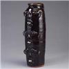 Image 1 : WALTER FLEMING three face totem jar with handle, covered in a mottled dark brown glossy glaze. Stamp