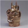 Image 1 : B.B. CRAIG devil's face jug covered in a brown and cream swirled glaze. Stamped B.B. CRAIG/VEIL, N.C