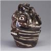 Image 1 : B.B. CRAIG double face jug covered in a brown, white, and indigo swirled glaze. Signed B.B.C. on bot