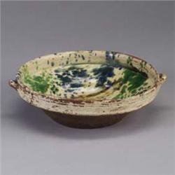 Spongeware bowl with cobalt, green, and brown decoration on a cream ground. Some loss to glaze, firi