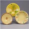 Image 1 : Three French pieces; a wall hanging plate in mottled green and yellow glaze, and two slipware decora