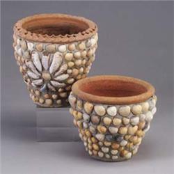 Two terra cotta planters with shell encrusted bodies, one with central floral medallion. Some missin