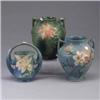 Image 1 : Three ROSEVILLE pieces; a blue Clematis basket, a blue Magnolia bulbous vase (92-8") with chip to fl