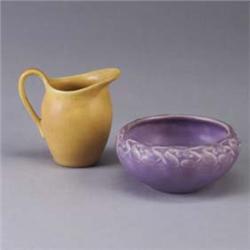 Two ROOKWOOD Production pieces; a small yellow pitcher, 1927, and a small lavender bowl with stylize