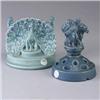 Image 1 : Two ROOKWOOD pieces; a bookend with peacock, 1924, and a flower frog with figural group on pedestal,