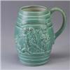 Image 1 : ROOKWOOD Cooperage beer mug with figures, 1943, covered in a pale green glaze. Flame mark. 8" Est.