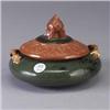 Image 1 : MATT MORGAN covered jar with base decorated with spiders and webs on a green ground, with vinescroll