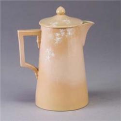 ROOKWOOD Limoges lidded pitcher by A.M. Valentien, 1888, decorated with stylized white daisies on a