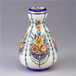 BOCH FRERE gourd-shaped vase with polychrome stylized flowers on white crackled ground. 1" line from
