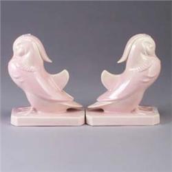 Pair of VILLEROY & BOCH pidgeon figurines covered in a sheer pink semi-matte glaze. Lines through th