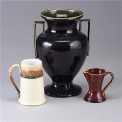 Three HAMPSHIRE pieces; a tankard (1" bruise to rim and spider line to base), a small brown pitcher