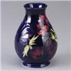 Image 1 : MOORCROFT bulbous vase in the Anemone pattern. Abrasion to rim. Stamped mark. 5 1/2" x 4" Est.  300