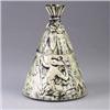 Image 1 : McCOY teepee-shaped cookie jar with embossed with a figure and symbolic motifs under a brushed gray