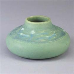 ROOKWOOD squat vessel, 1907, with blue and white decoration on a matte green ground. Flame mark/arti