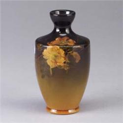 ROOKWOOD Standard glaze vase, 1897, decorated with yellow roses on a shaded yellow to umber ground.