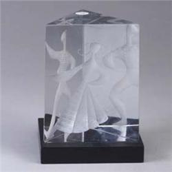 LINSTRAND FOR KOSTA triangular glass sculpture with dancing figures on a wooden base. Detached from