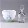 Image 1 : Two glass pieces; a KOSTA BODA bowl with birds and trees, and a ORREFORS bottle with stopper, etched