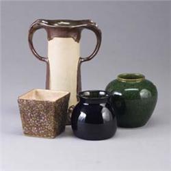 Four pieces; a BRETBY bulbous vase covered in a speckled green and umber glaze, a bulbous vase in a