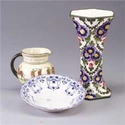Three pieces; a ROYAL DOULTON Bayeux Tapesty pitcher (repair to rim), an ANNABERG corseted vase pain