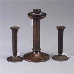 Three ROYCROFT pieces; a candlestick and a pair of bud vases. All marked. Tallest: 6" Est.  300 - 40