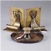 Image 1 : Three ROYCROFT brass-washed hammered copper pieces: a pair of bookends with scroll and ring handle (