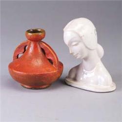 Two pieces of MOUNTAINSIDE POTTERY; a woman's bust covered in a glossy white glaze, and an orange sq