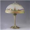 Image 1 : Arts & Crafts table lamp with hammered glass dome shade, reverse-painted with a country landscape, o