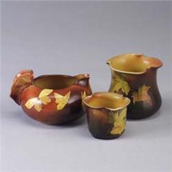 Three pieces of ROOKWOOD Standard Glaze; a small pitcher with butterfly handle, 1891, and two vessel
