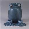 Image 1 : Three blue ROOKWOOD Production pieces; a bulbous vase, 1923, and a pair of low floriform candlestick