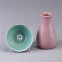 Two pieces; an S.E.G. pale pink bulbous bud vase and a small turquoise PAUL REVERE bowl. Both marked