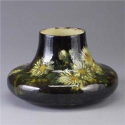 CROWN POINT WARE squat vessel painted with yellow flowers on a mottled brown ground. Tight line to r