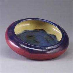 FULPER low bowl, the exterior covered in purple and magenta glazes, the interior in a yellow and Chi