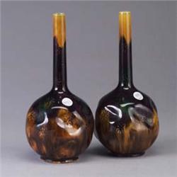Pair of RORSTRAND bottle-shaped vases each covered in a mottled deep purple to umber glaze. Stamped