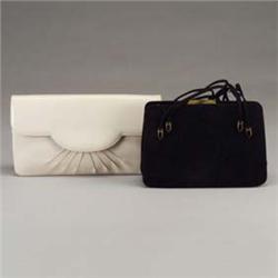 Two JUDITH LEIBER purses: a black suede purse with brushed-brass snap-clasp, open side pockets and d