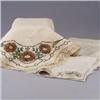 Image 1 : Two embroidered linen pieces, a runner and a square table mat, both with flowers. Minor wear to runn