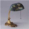 Image 1 : Brass-washed desk lamp with frosted glass shade, reverse painted with landscape. Some wear to metal,