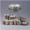 Image 1 : Twenty-four piece ceramic tea set consisting of a small teapot, ten cups, ten bowls (one broken), a