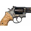 Image 3 : Stunning Engraved and Gold Inlaid Smith & Wesson Model 19-2 Double Action Revolver with Carved Ivory