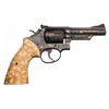 Image 4 : Stunning Engraved and Gold Inlaid Smith & Wesson Model 19-2 Double Action Revolver with Carved Ivory