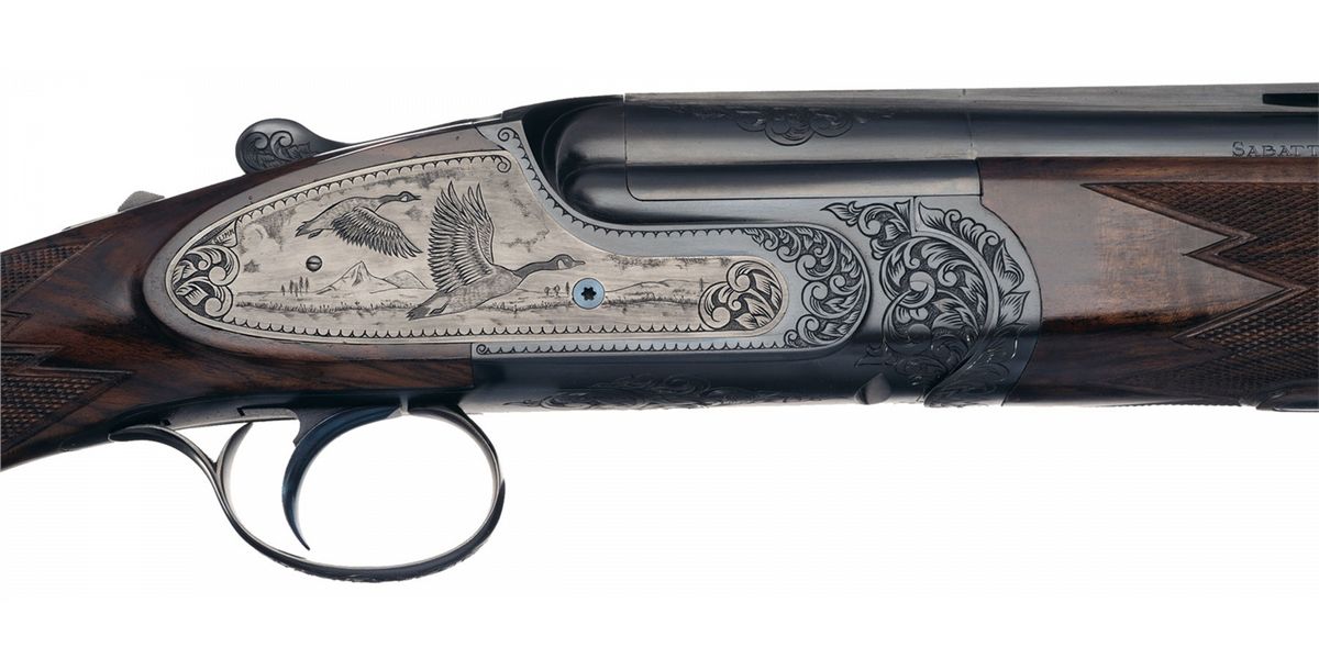 Engraved Sabatti Over/Under Shotgun with Leather Case and Accessories