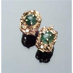 Pair of 14-Karat Yellow Gold, Emerald and Diamond Cufflinks Each set with one oval high cabochon...