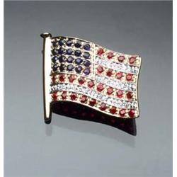 14-Karat Yellow and White Gold, Diamond, Blue Sapphire and Ruby American Flag Brooch The stars se...