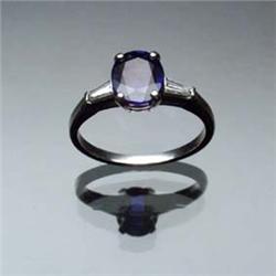 Platinum, Blue Sapphire and Diamond Dinner Ring Set with one oval faceted sapphire weighing appro...