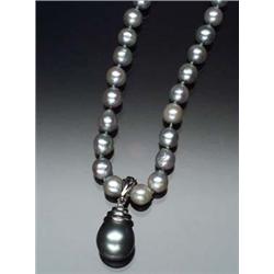 Cultured Pearl Necklace and Pearl Enhancer The single strand having forty-seven blue-gray baroque...