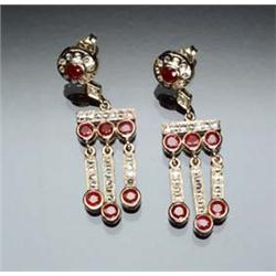 Pair of 14-Karat Yellow Gold, Diamond and Ruby Tassel Pierced Earrings Each set with seven round...