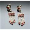 Image 1 : Pair of 14-Karat Yellow Gold, Diamond and Ruby Tassel Pierced Earrings Each set with seven round...